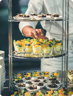 restaurant-s-chef-preparing-buffet-sweet-dessert-dinner