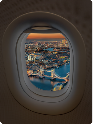 tower-bridge-thames-river-city-seen-through-airplane-window-dusk